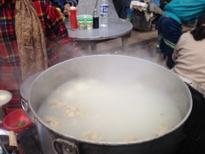 The steaming soup container